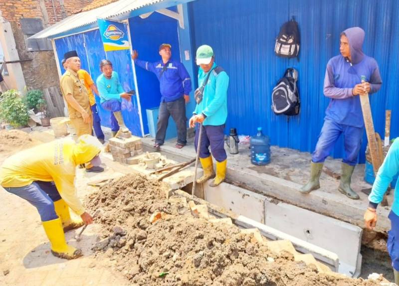 Dinas PUPR Kota Tangerang Terus Lakukan Perbaikan Drainase.